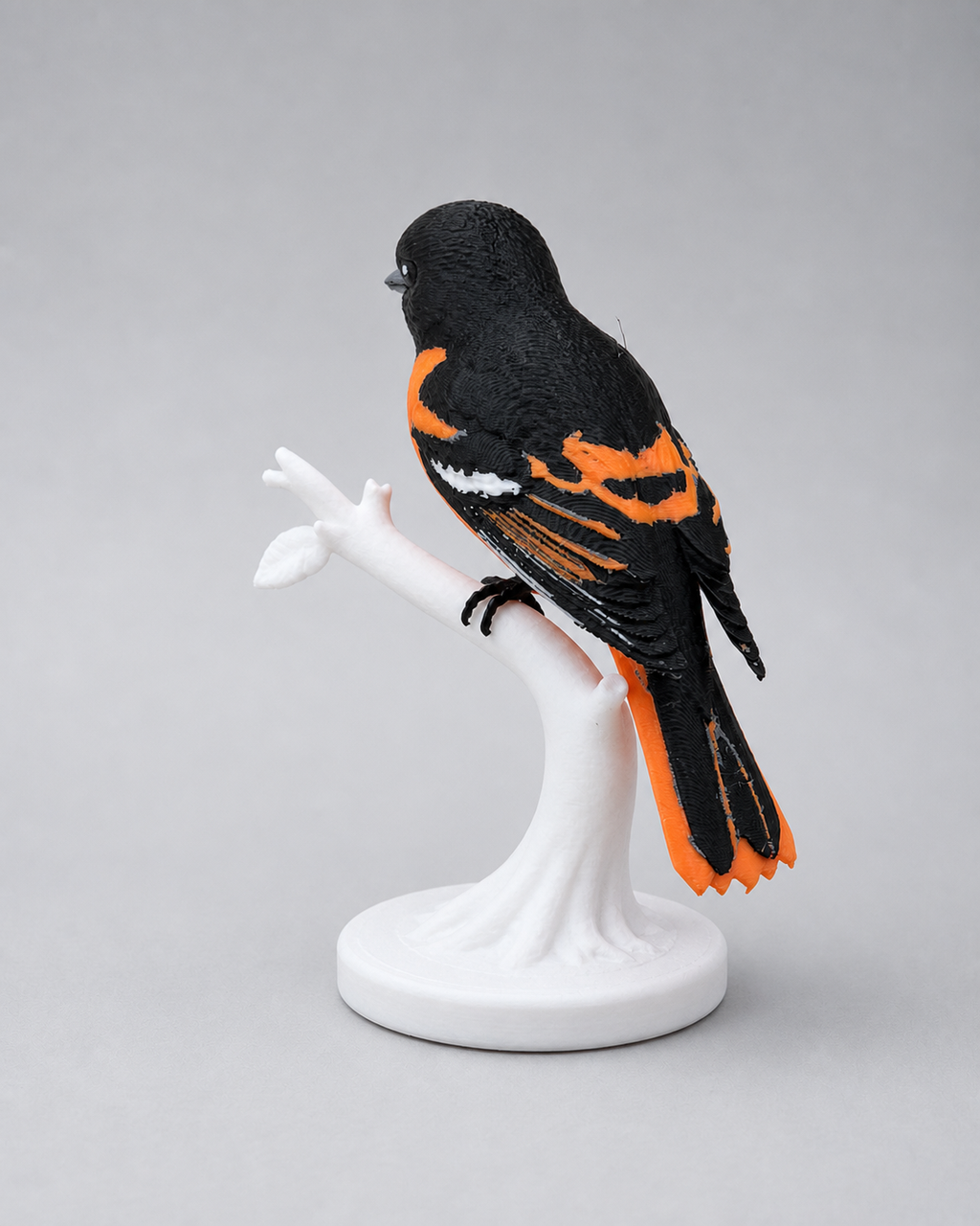 Emberwing Baltimore-Pirol – mehrfarbige Vogelskulptur FehnFactory