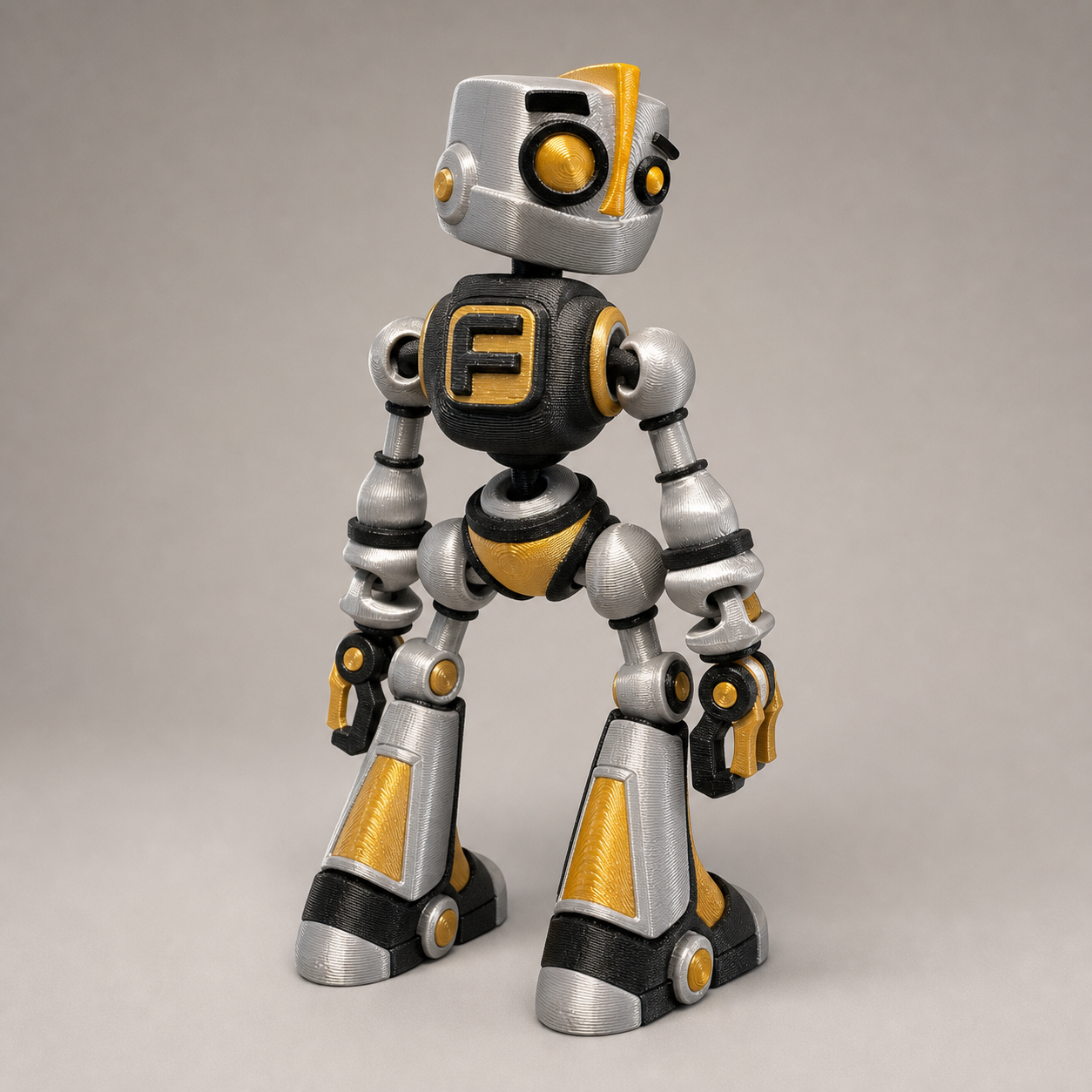 Fokobot – bewegliche Roboterfigur in Silber, Schwarz und Gold, 16,1 cm FehnFactory